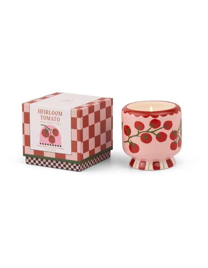 A dopo 8oz Hand Painted Tomato Vine Ceramic Candle in Heirloom Tomato