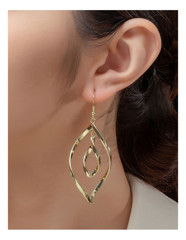 Elongated Teardrop Twist Earrings in Gold