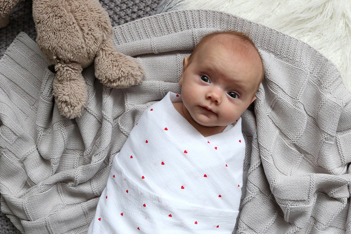 Stretch Muslin Wrap by Little Turtle Baby Color White with Pink Leaves