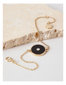 Gold and Black Disc Bracelet in Black
