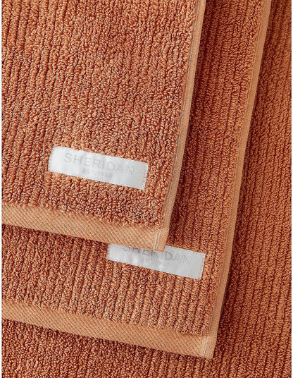 LIVING TEXTURES HAND TOWEL IN MAPLE