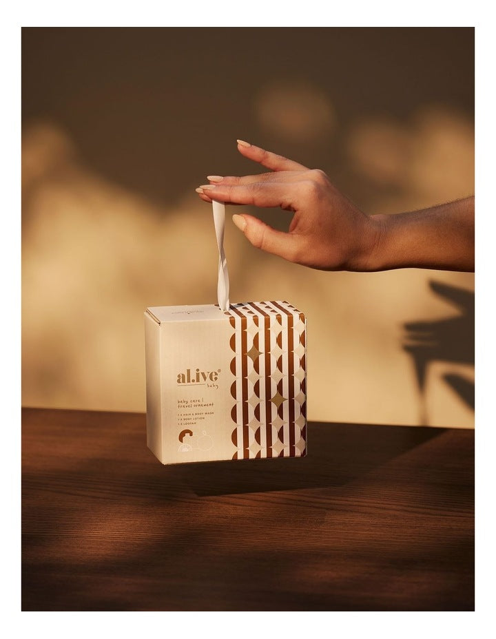 Baby Care Travel Ornament in Calming Oatmeal