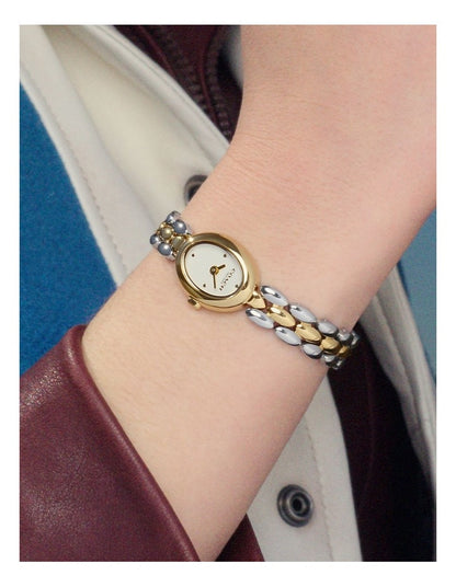 0ammy Stainless Steel & Gold Steel Chalk Dial Women's Watch