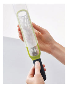 Handi Zest Mini Zester with Cleaning Blade in Green