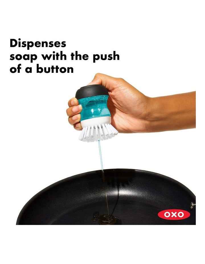 Good Grips Soap Dispensing Palm Brush in Black