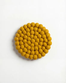 Aveva Mustard Wool Round Trivet